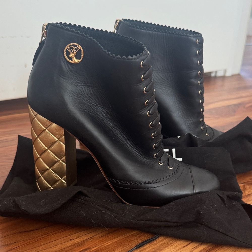 CHANEL Black and Gold Heeled Boots